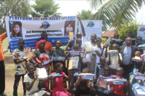 Children Holding Books and Banner