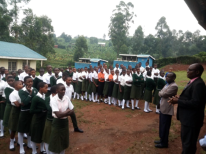 Students Listening Lecture From Principal