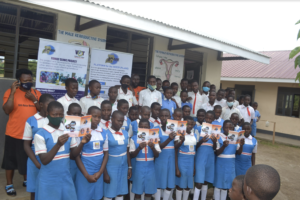 Children Holding Books Outside School